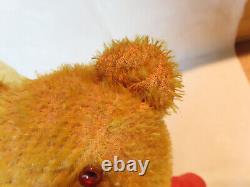 Antique mohair & cloth Teddy Bear, excelsior stuffing, sewn on clothing 14 tall