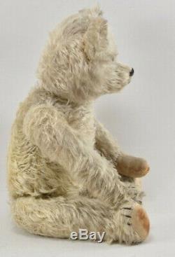 Large antique jointed marvelous teddy bear 22 inches deep long mohair