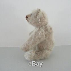 Rare 5 1/8 white mohair'rattle' teddy by STEIFF circa 1920